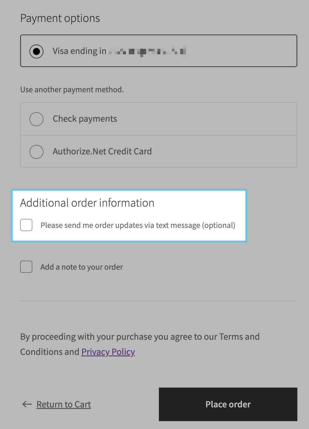 The Twilio SMS opt-in checkbox as it appears in the WooCommerce Checkout Block. The default label of "Please send me order updates via text message (optional)" appears in the "Additional order information" section near the bottom of the checkout form.